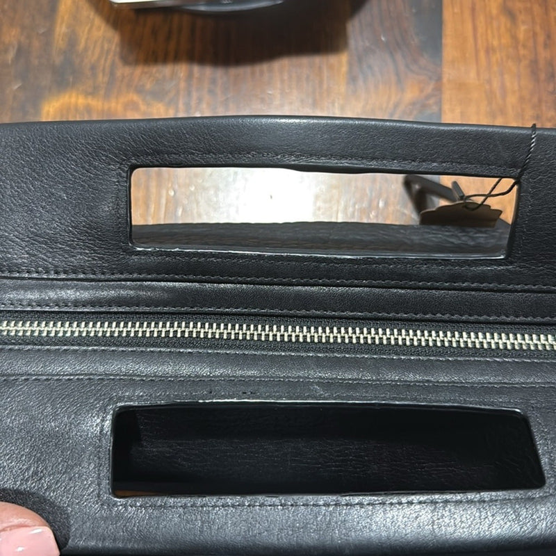 Coach Bleecher Leather Clutch.
