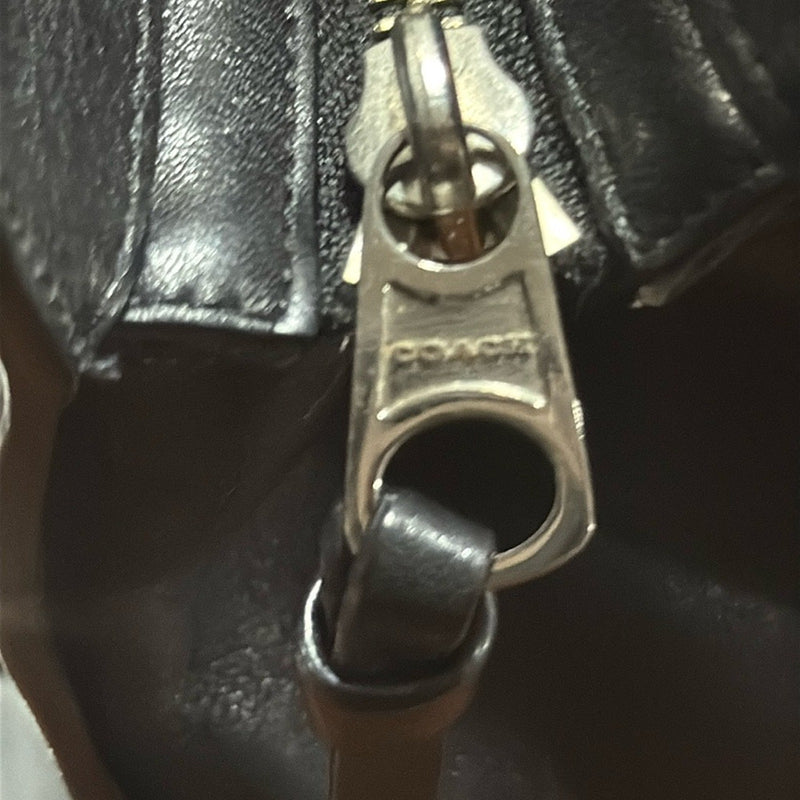 Coach Bleecher Leather Clutch.