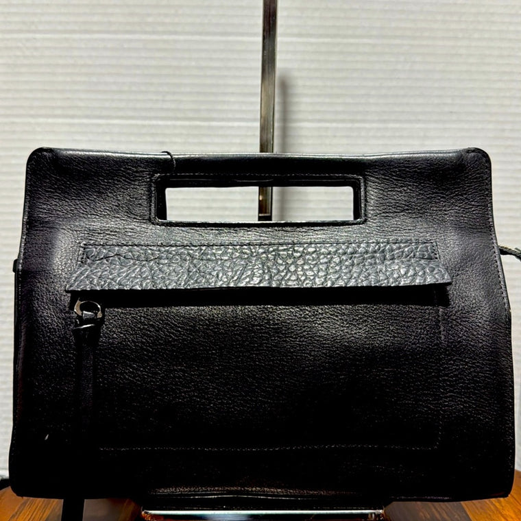 Coach Bleecher Leather Clutch.