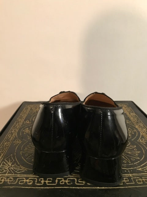 Salvatore ferragamo black flats hot sale
